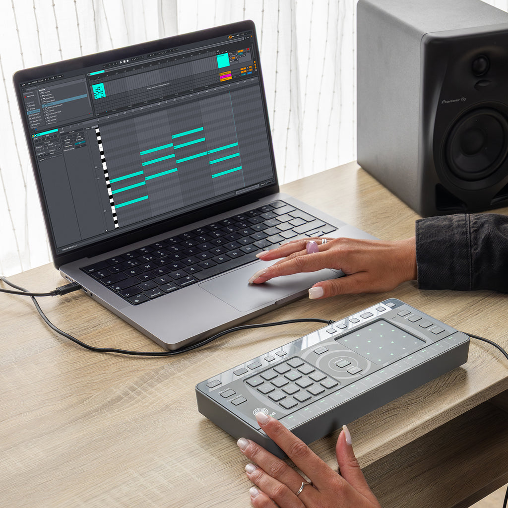 AlphaTheta ChordCat DJ pad controller, used beside laptop with DAW.