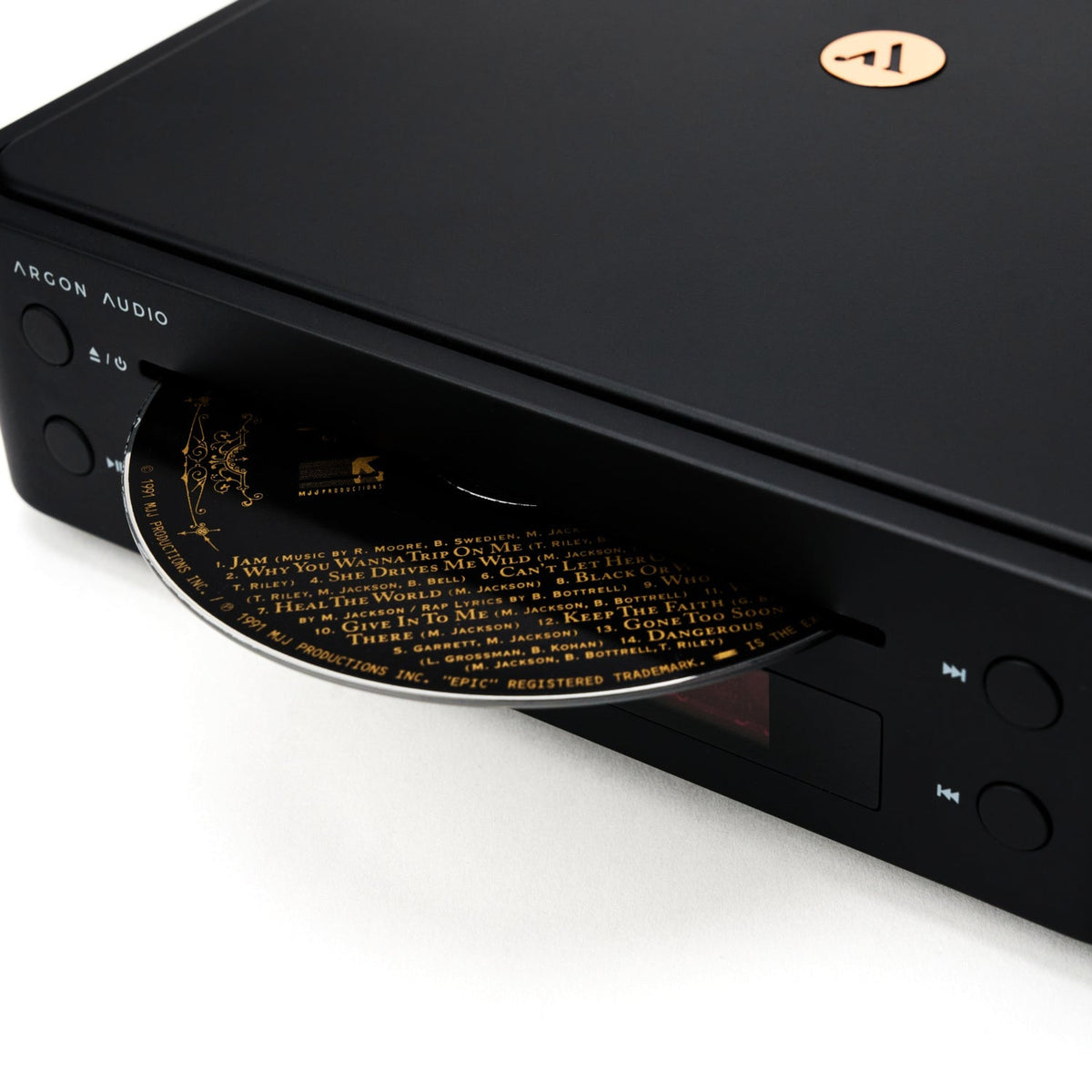 Argon Audio CD1 Black loading a disc into the slot-loading CD drive
