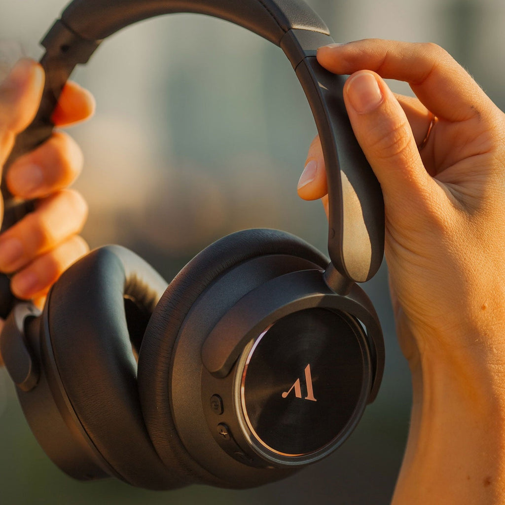 Argon Audio Quiet Storm Black held in two hands, ear cup detail