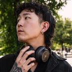Argon Audio Quiet Storm Black worn around the neck outdoors