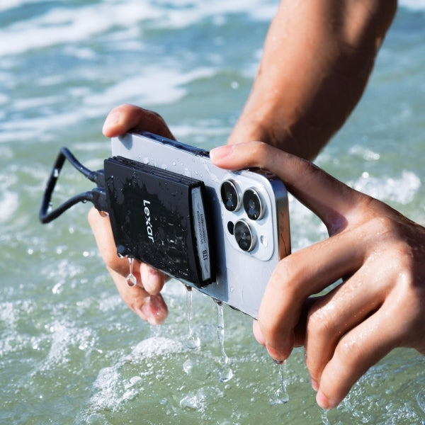 Lexar Armor 700 portable SSD external drive with rugged black design and USB-C connector for fast data transfer.