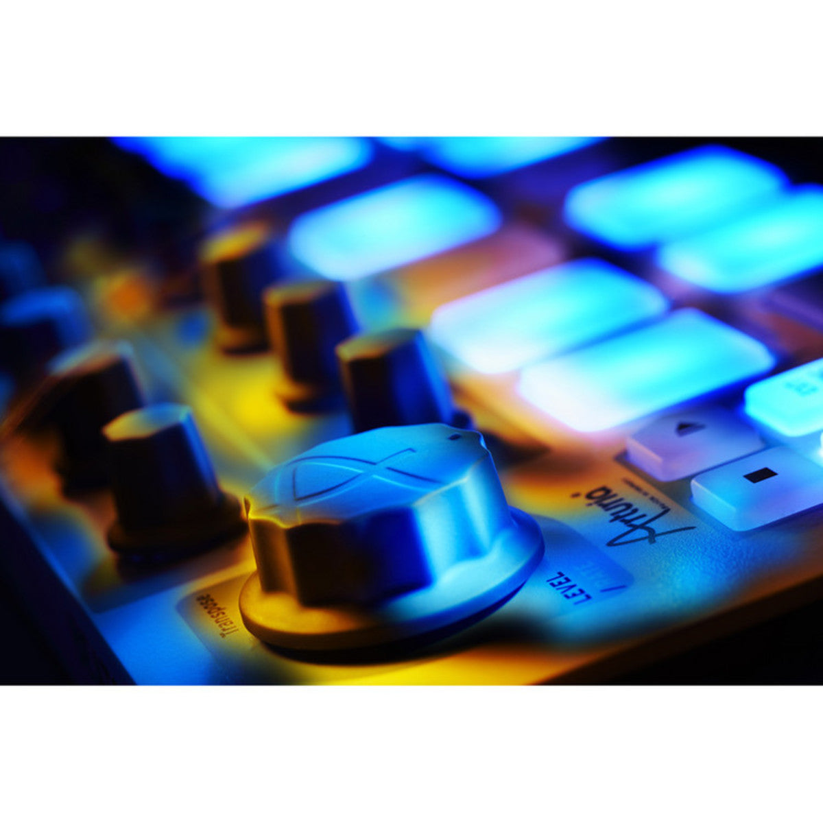 Arturia BeatStep sequencer with step buttons, knobs, and CV/Gate outputs on a sleek black interface.