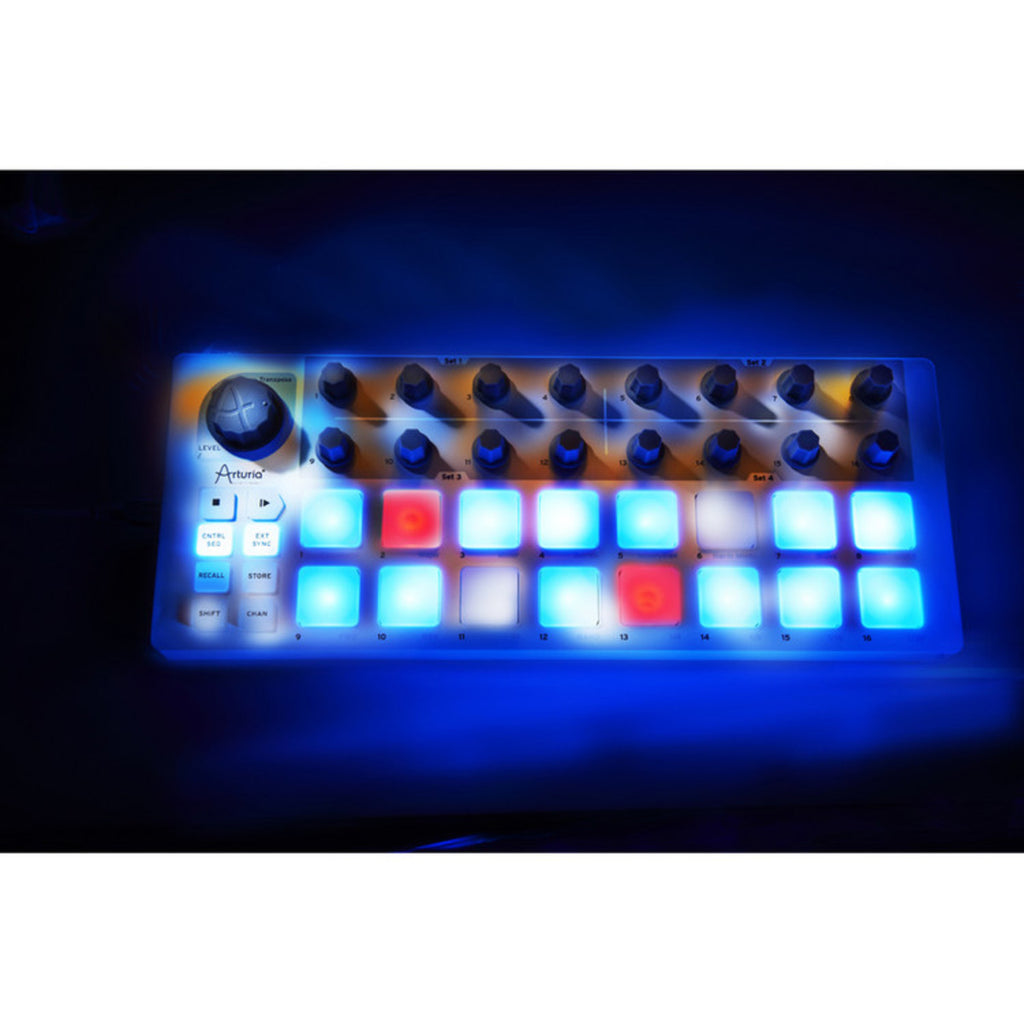 Arturia BeatStep sequencer with pads and knobs, showing its compact design and control interface in a close-up shot.