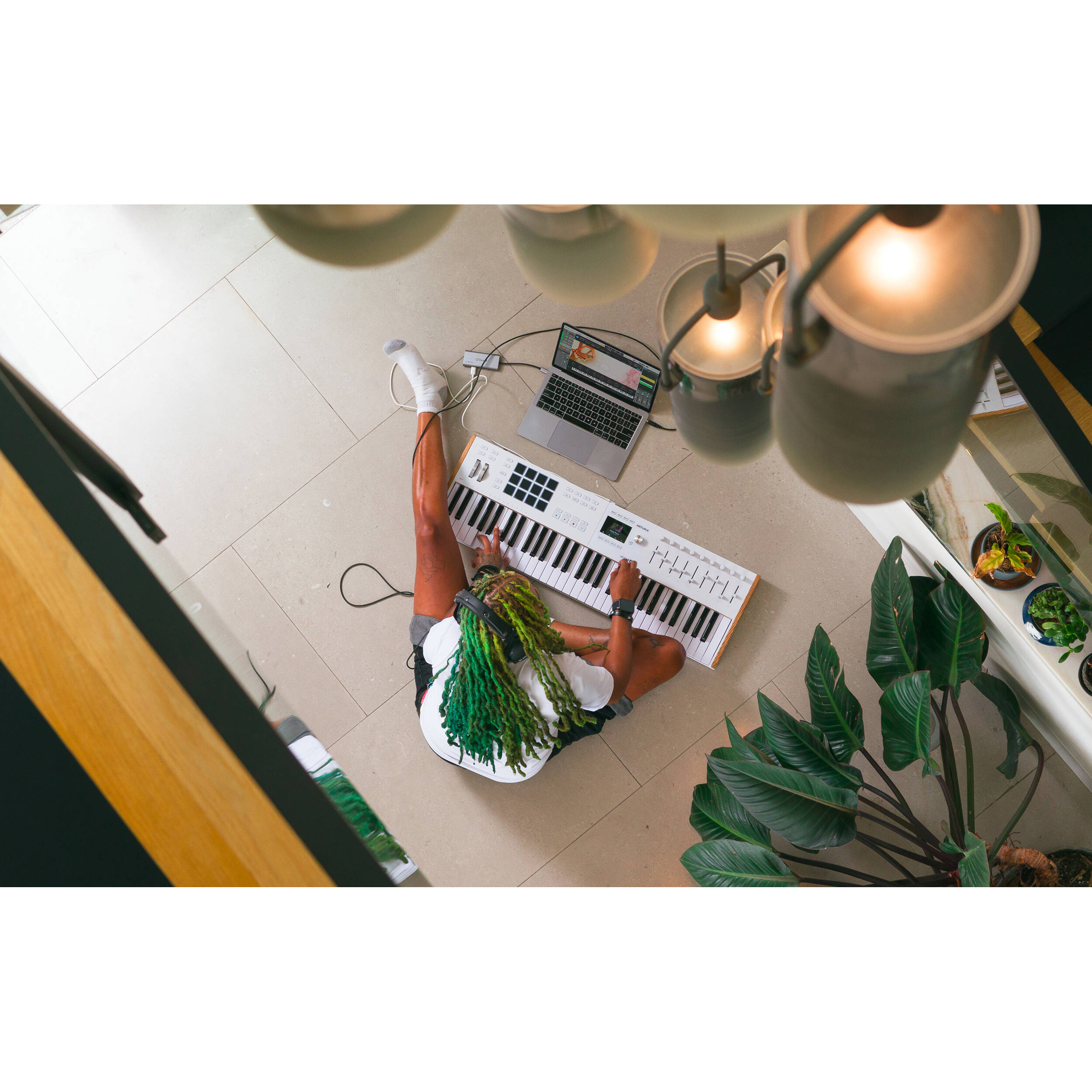 Arturia KeyLab 49 MK3 MIDI keyboard with 49 keys and control knobs, displayed on a white background.