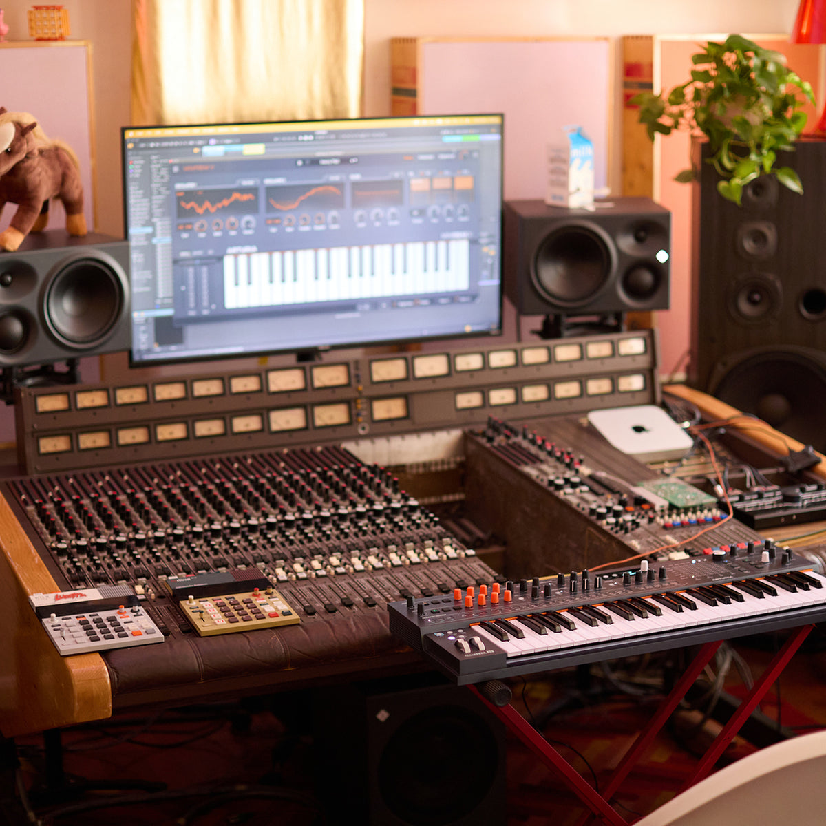 Arturia MiniFreak 49 synthesizer in a recording studio setup with MiniFreak V plugin