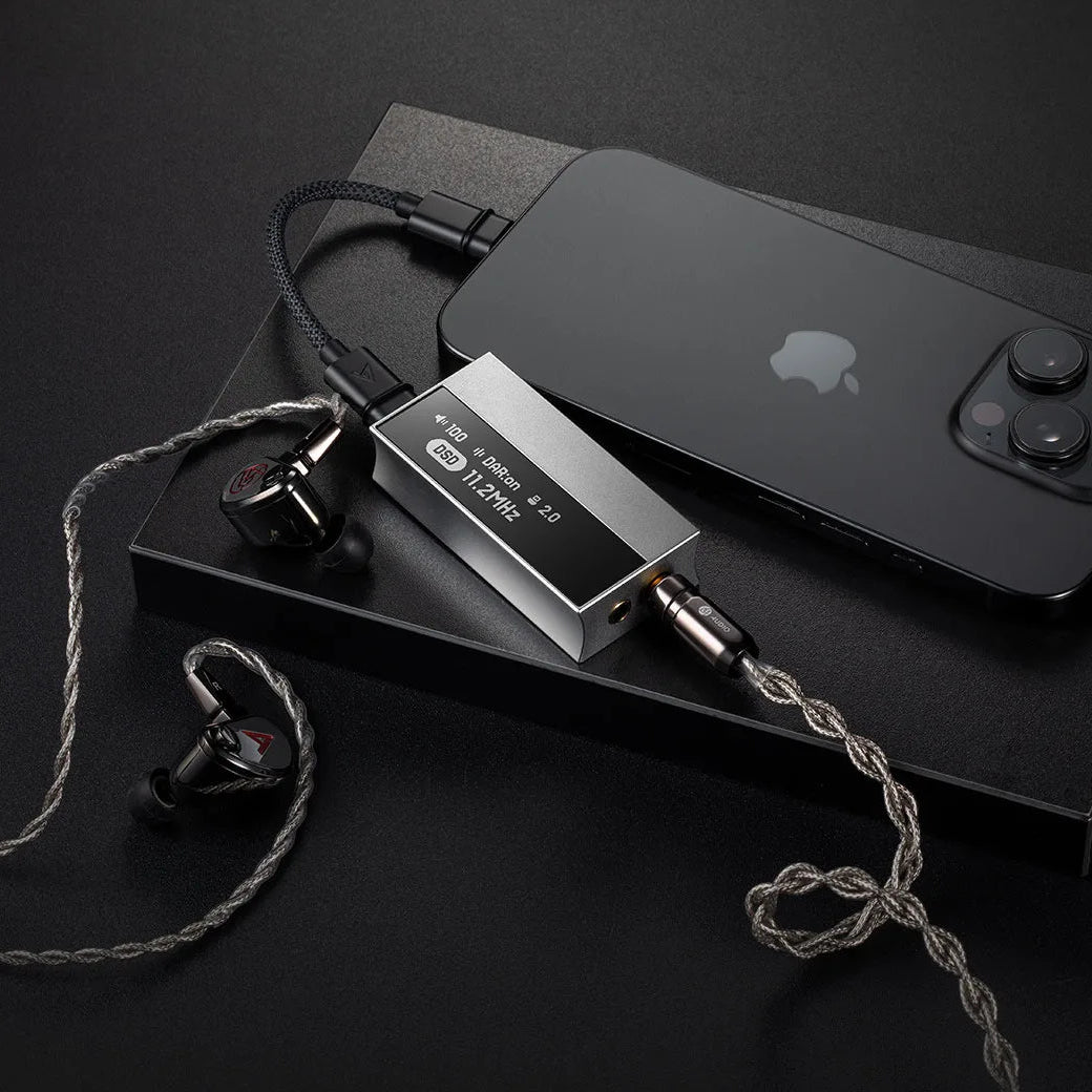 Astell&Kern AK HC5 headphone amplifier and DAC with sleek black design and multiple input options on the front panel.