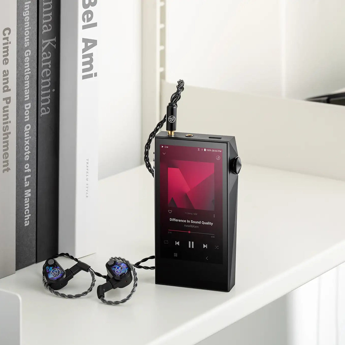 Astell&Kern A&ultima SP3000M portable music player with sleek design, displayed in a lifestyle setting.