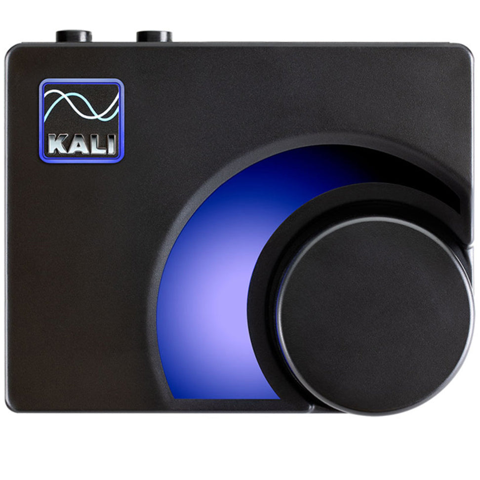Kali Audio MV-BT studio monitor controller with multiple input options and Bluetooth connectivity, shown on a desk setup.