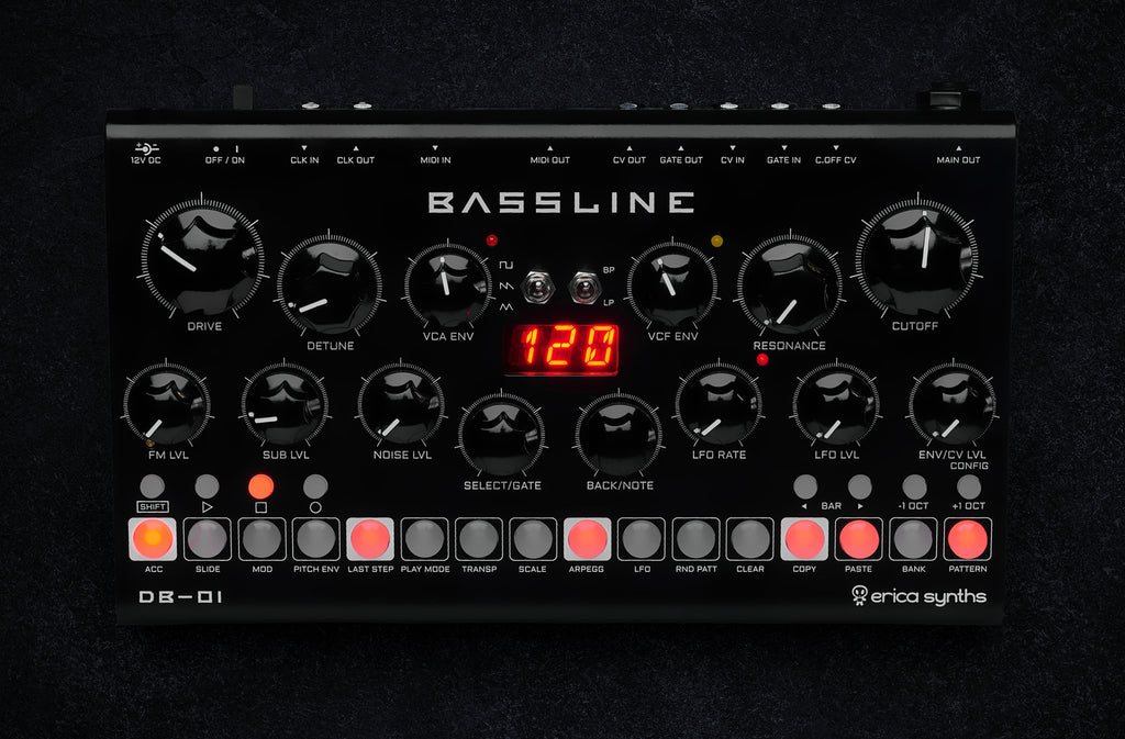 Erica Synths Desktop Bassline DB-01 synthesizer with knobs and cables, compact electronic music instrument for bass sounds.