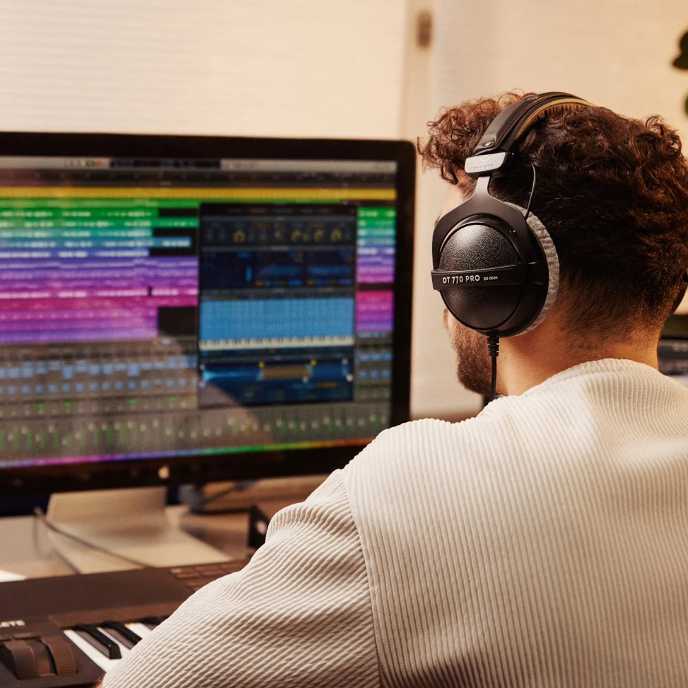 Beyerdynamic DT 770 Pro (80 Ω) studio headphones, in black, lifestyle setting
