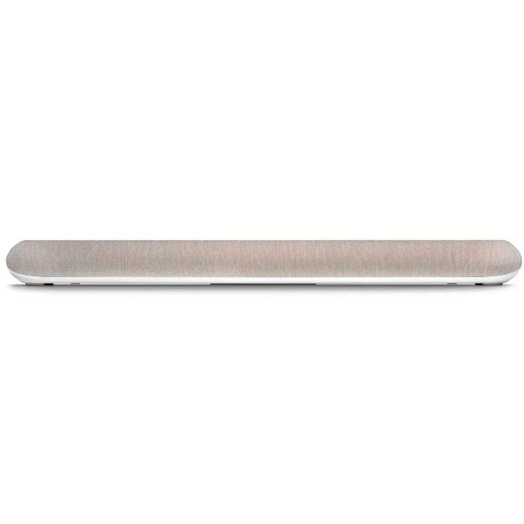 Ivory Bluesound Pulse Cinema Mini soundbar with sleek front design, placed on a table, showcasing compact home theater audio.