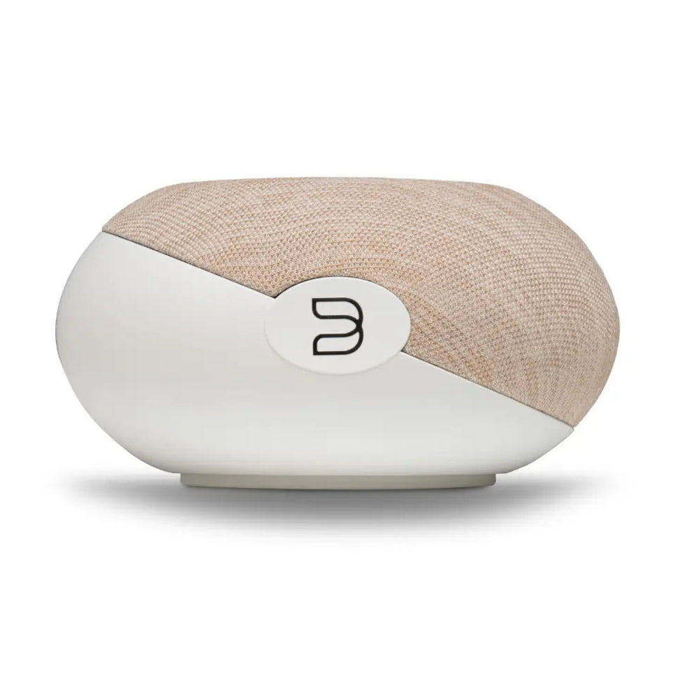 Bluesound Pulse Cinema Mini Ivory soundbar with sleek right side view on a tabletop, showcasing modern TV speaker design.