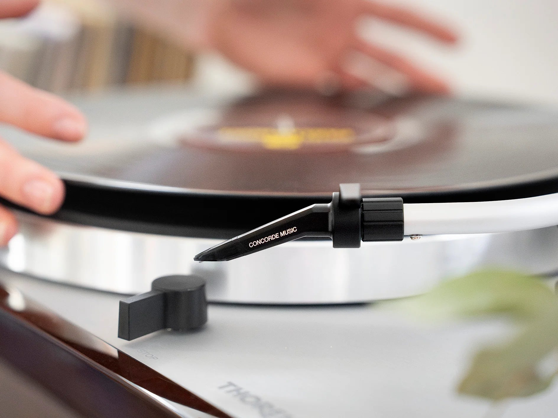 Ortofon Concorde Music Black turntable cartridge mounted on Thorens turntable, showcasing sleek black design and stylus.
