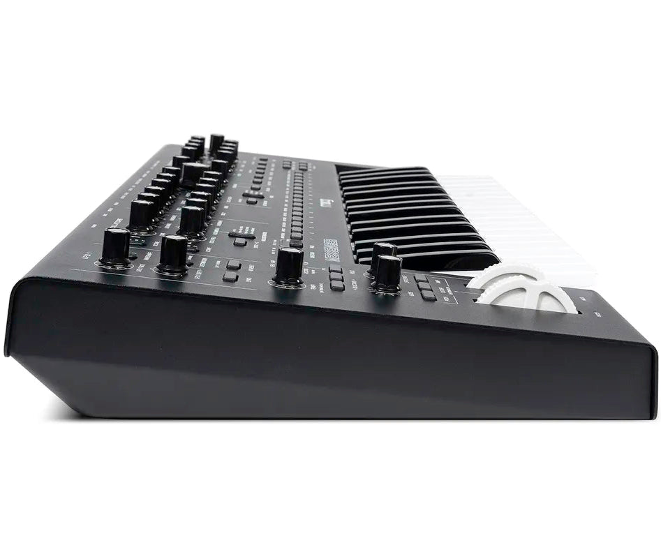 Moog Messenger synthesizer with knobs, buttons, and interface showing a compact Moog synthesizer for music production.