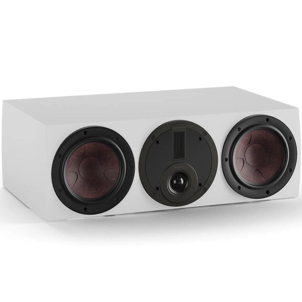 DALI Rubikore Cinema center speaker in high-gloss white with sleek design, showcasing its front grille and modern aesthetic.