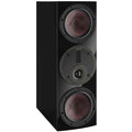 DALI Rubikore Cinema center speaker in high gloss black, showcasing sleek design and front grille, ideal for home theater audio.