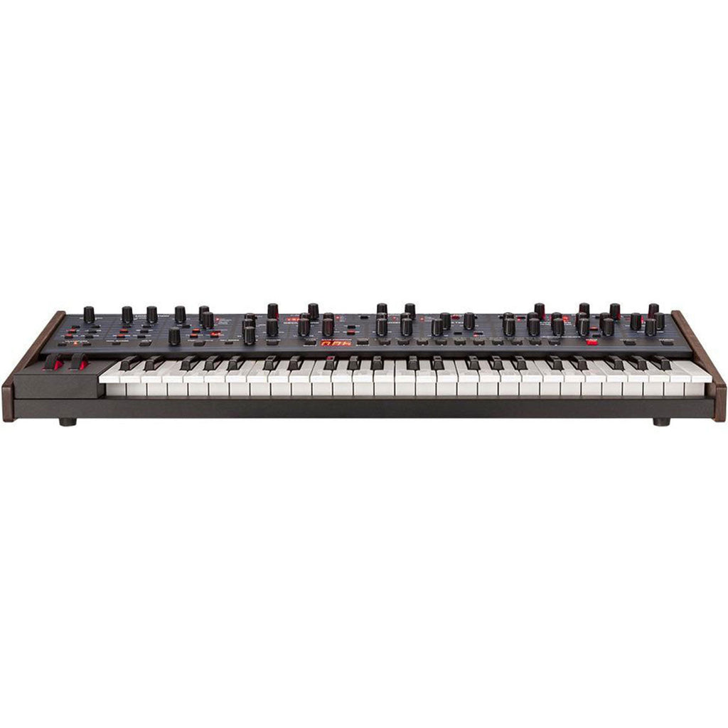 Sequential OB-6 synthesizer with a sleek control panel and keyboard, featuring knobs and keys for rich analog sound creation.