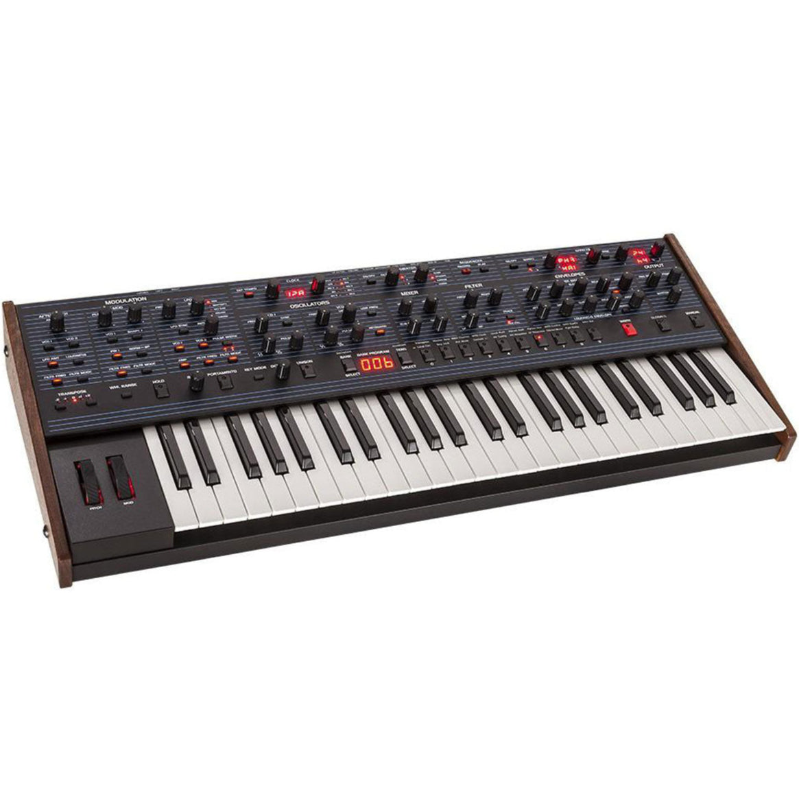 Sequential OB-6 synthesizer by Dave Smith Instruments with control knobs and keyboard in a studio setting.