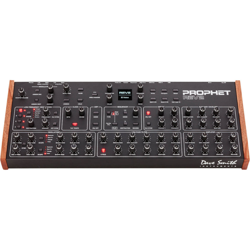 Sequential Prophet Rev2-16 desktop synthesizer with control panel and keyboard interface, showcasing its knobs and digital screen.