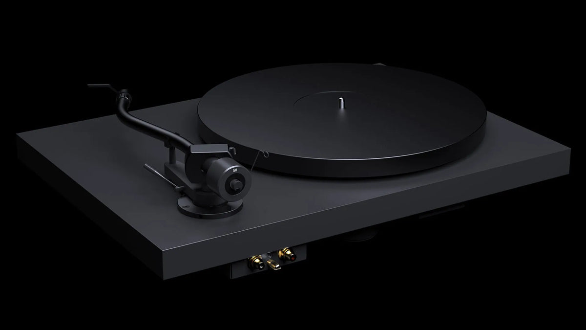 Rear view of Pro-Ject Debut Pro S turntable in Satin Black, showcasing its tonearm, platter, and connection ports.