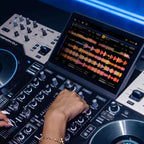 Denon DJ Prime 4 G2, DJ mixing on the 10.1-inch touchscreen during a set