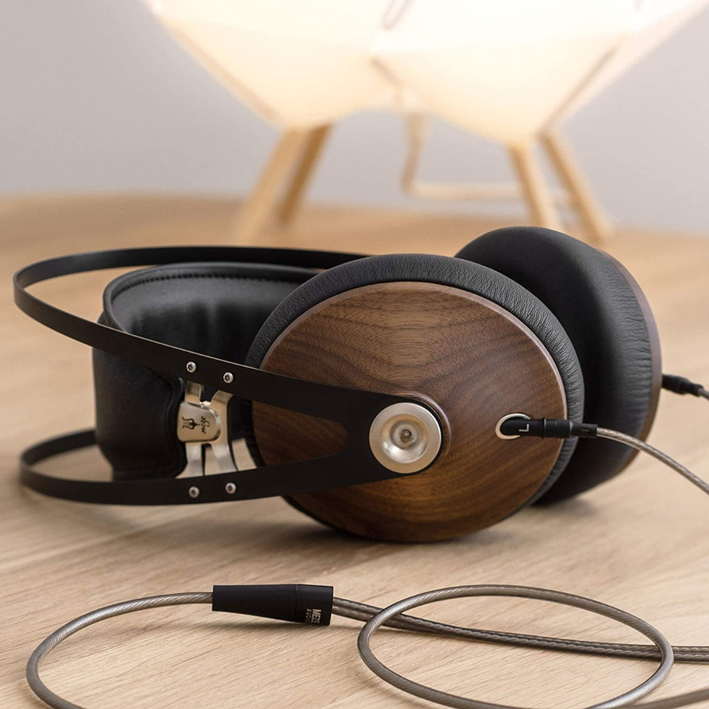 Wired Meze Audio 99 Classics headphones with walnut ear cups and silver accents, showcasing their stylish design and comfortable fit.