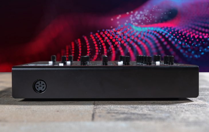Dtronics DT-200 V3 synthesizer with multiple knobs and buttons, black and silver design, electronic music instrument.