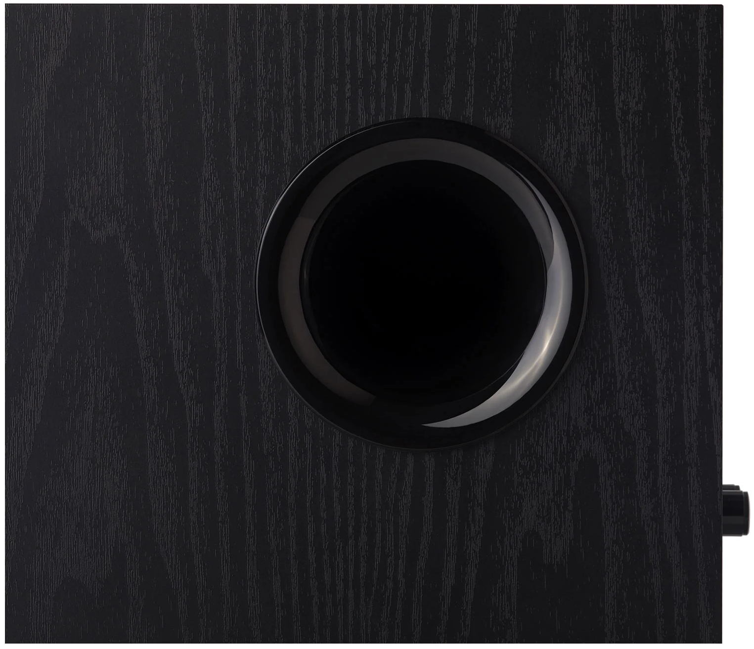Black Edifier T5 powered subwoofer with sleek design, featuring a circular speaker grille and control panel on top.