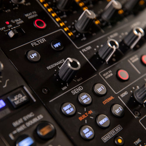 Pioneer DJ DJM-V10-LF mixer with multiple effects controls and colorful LED displays for professional DJ performances