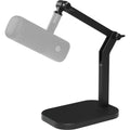 Elgato Wave Desk Stand holding a desktop microphone, designed for stable placement and easy access during recording.