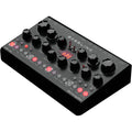 Erica Synths Desktop Bassline DB-01 synthesizer with knobs and patch points, compact desktop design for bass sound creation.