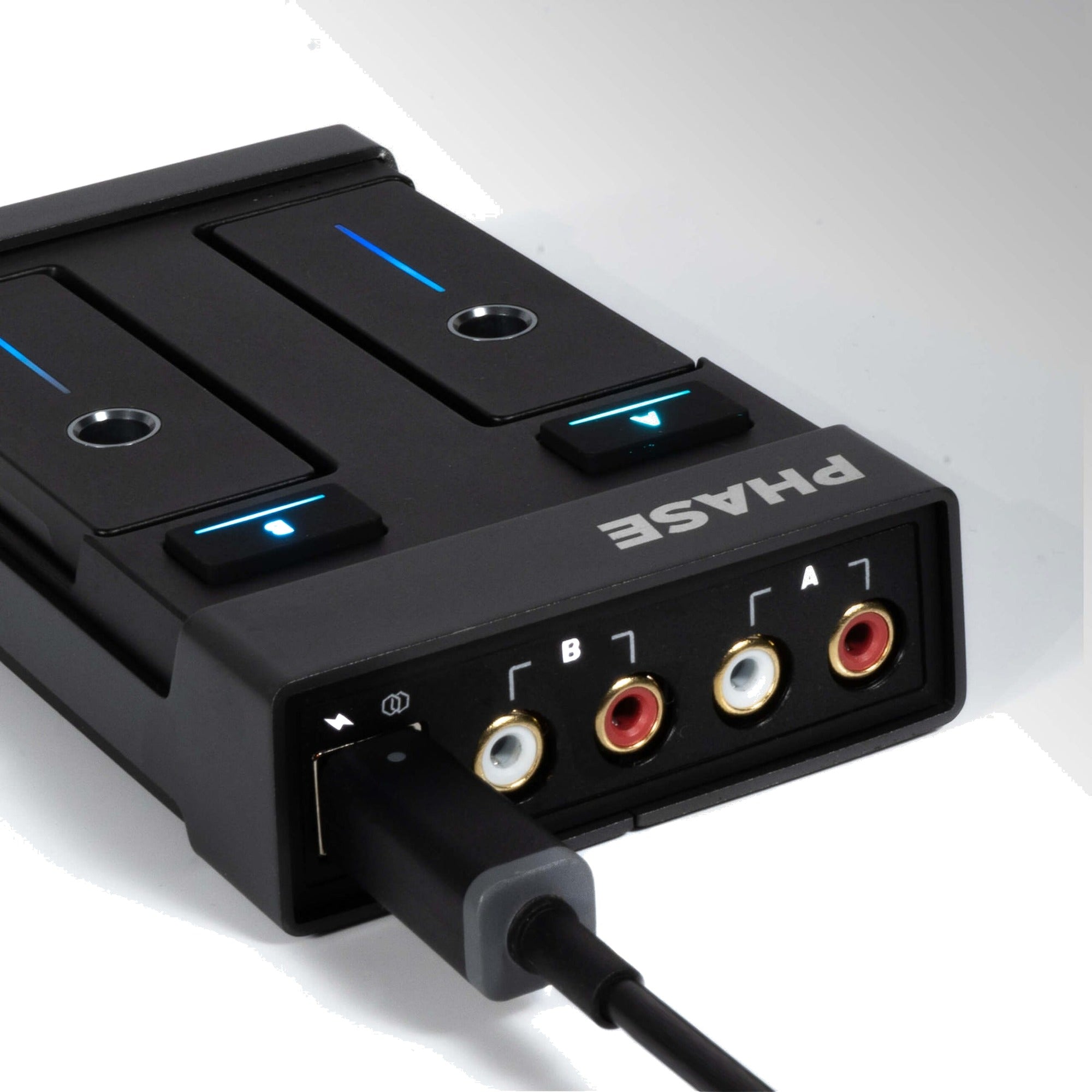 Phase Essential DVS and timecode connectors for DJ equipment, showing various connection ports on a sleek, professional interface.