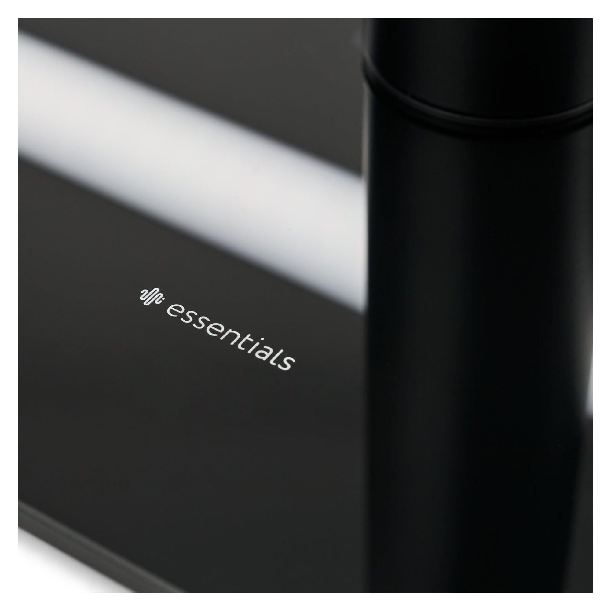 Essentials Monno 60 glass base with Essentials logo