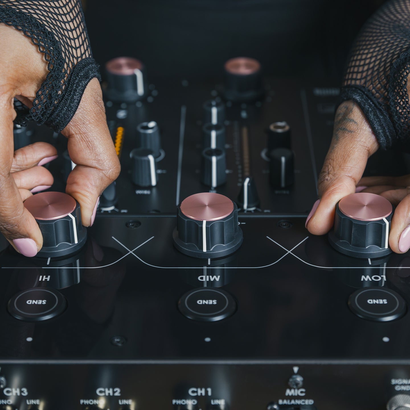 AlphaTheta Euphonia DJ Mixer showing control knobs, faders, and input ports on a sleek professional audio device.