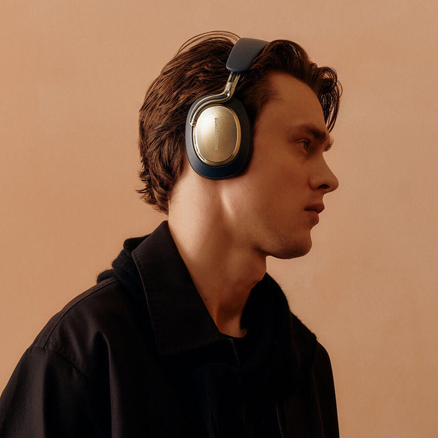 Bowers & Wilkins Px8 S2 wireless headphones with sleek black design and cushioned ear cups on a white background.