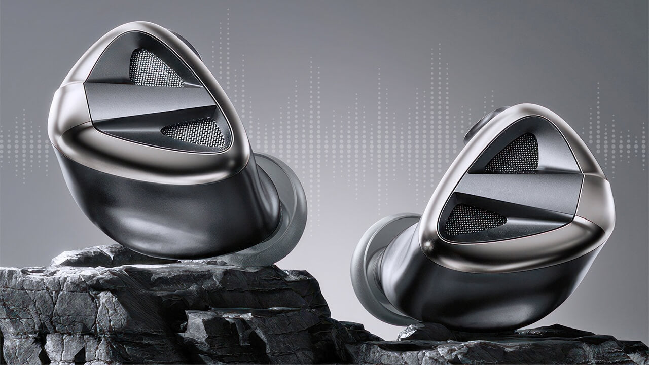 FiiO FH19 in-ear headphones with silver metallic finish and detachable cables, positioned on a white background.