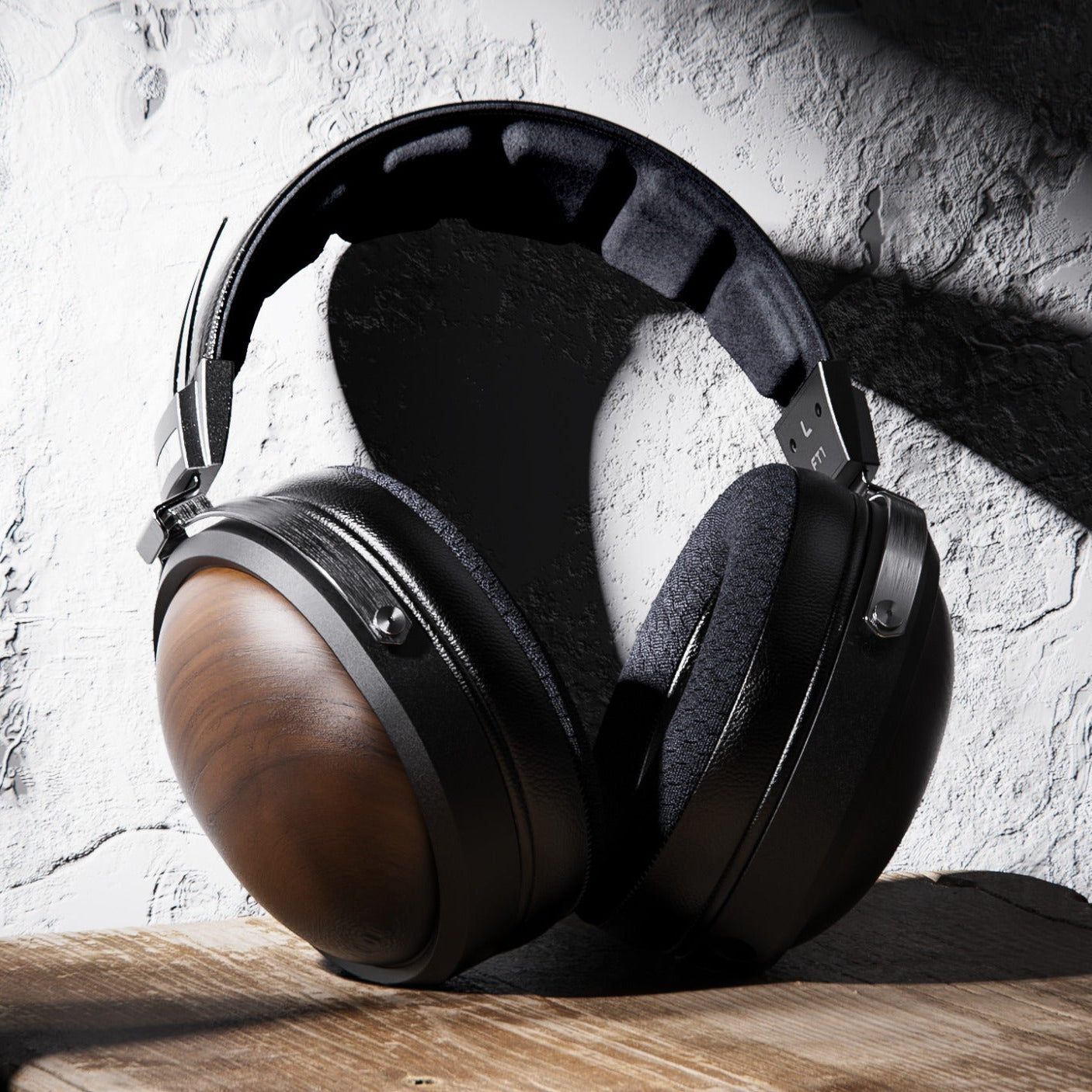 FiiO FT1 closed-back over-ear headphones with walnut wood cups, in black