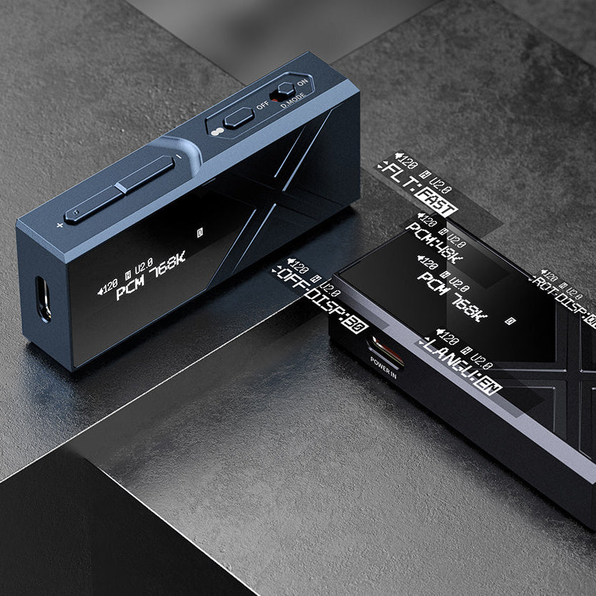 FiiO KA17 headphone amp / DAC, lifestyle on a desk with cable