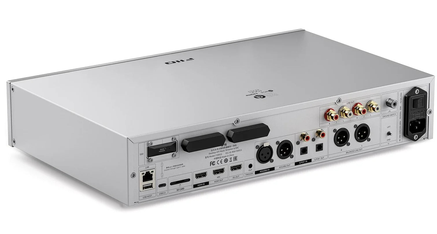 FiiO S15 music streamer and DAC with sleek black design, multiple input ports, and compact build for high-quality audio streaming.