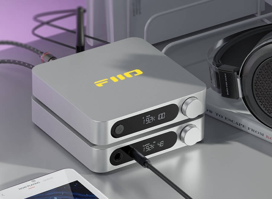 FiiO SR11 music streamer device with sleek black design and multiple connectivity ports for high-quality audio streaming.