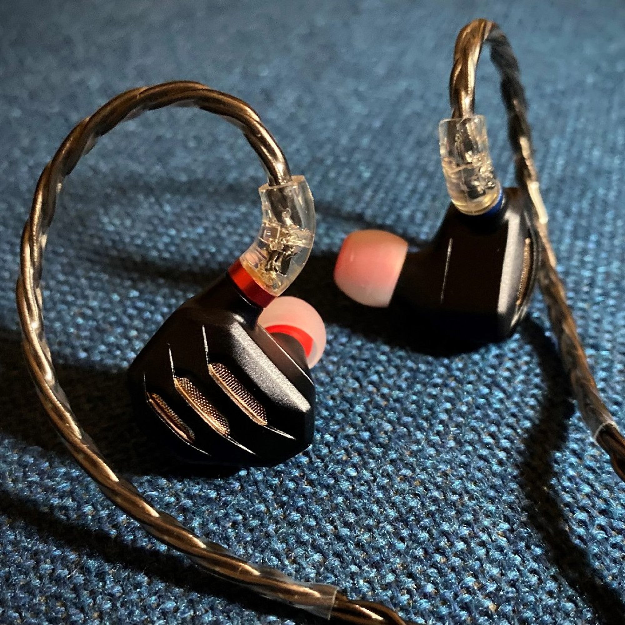 FiiO FH7S in-ear headphones with silver and black design, detailed earbud and cable visible in the image.