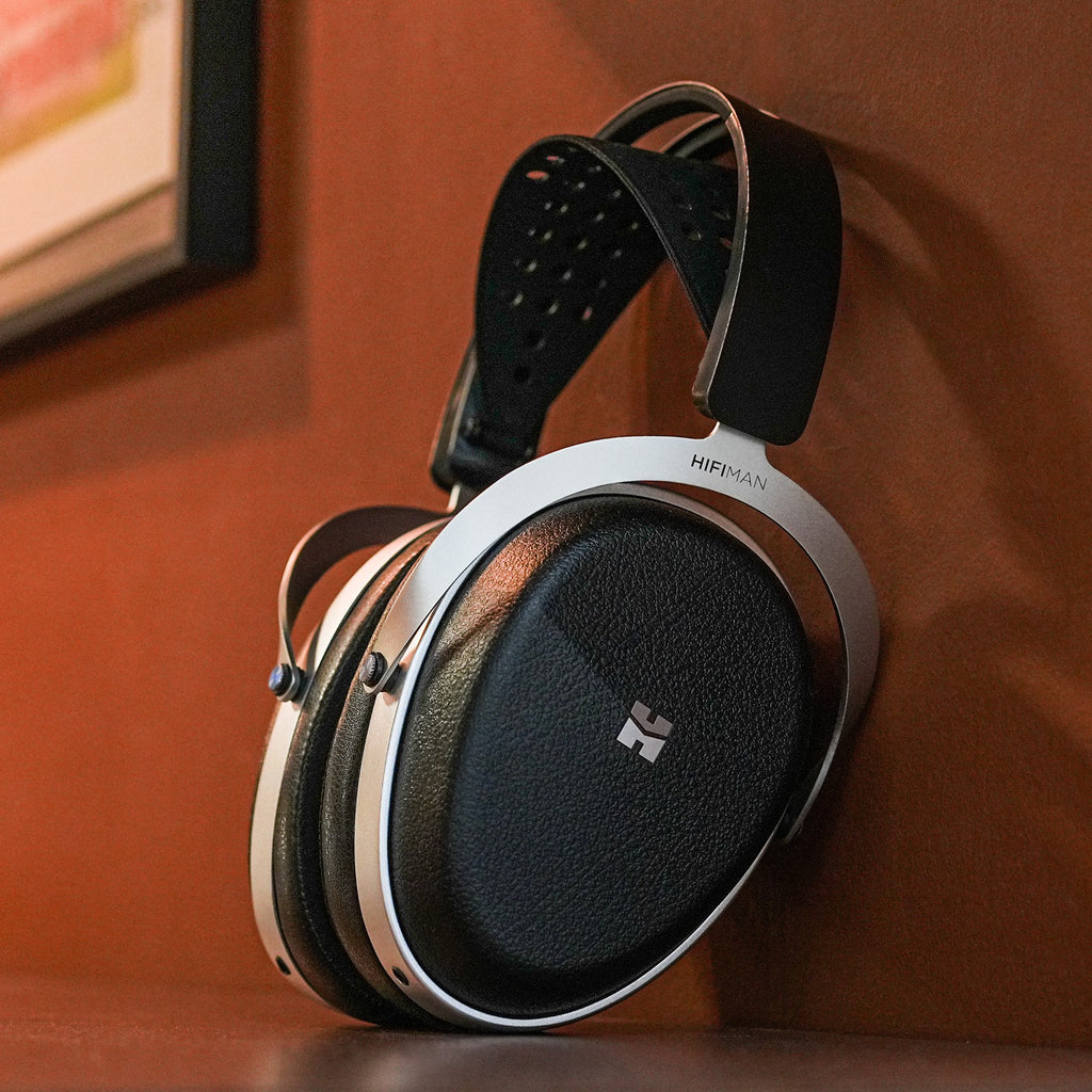 HiFiMAN Audivina LE wired headphones with sleek black design and over-ear cushions for immersive sound experience.