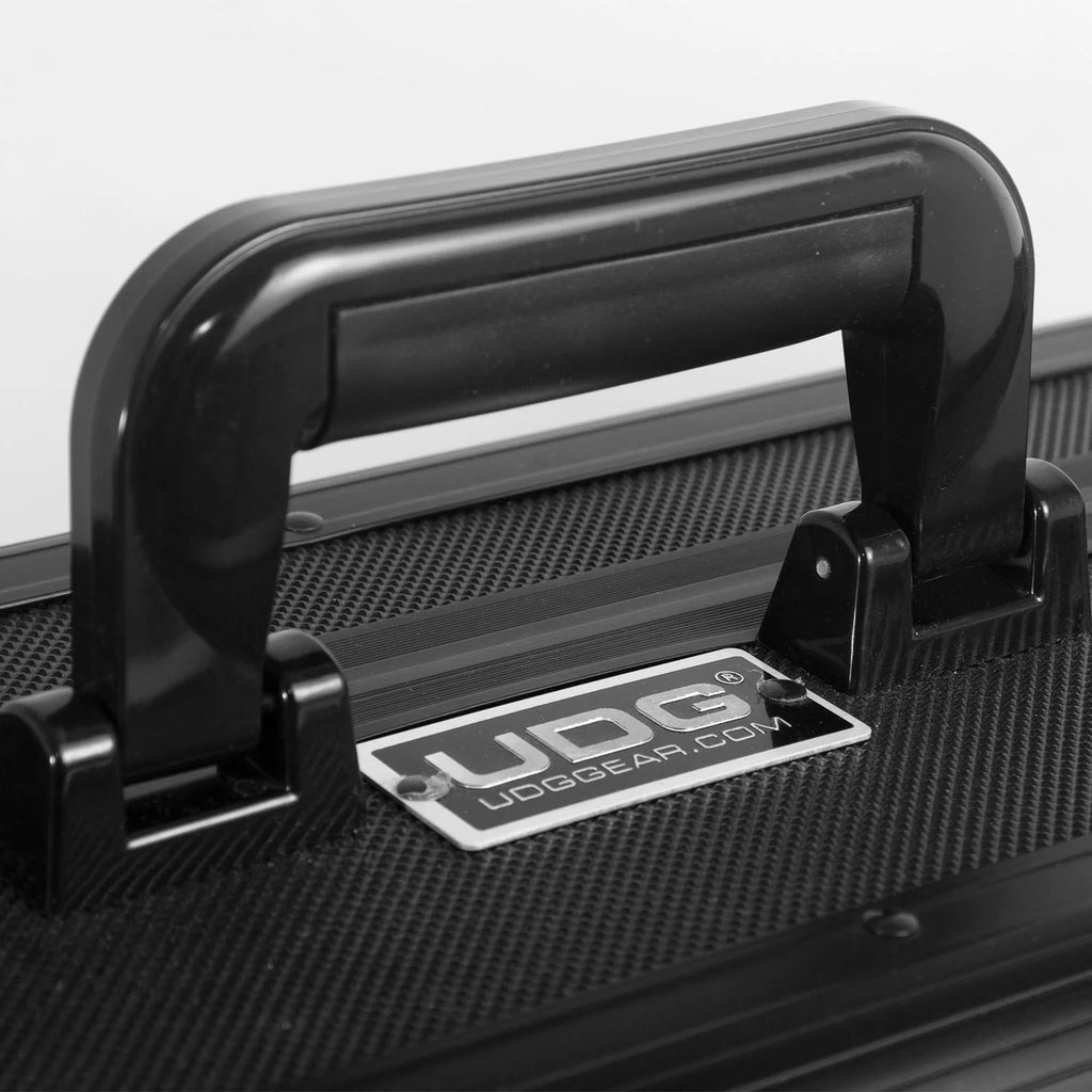 UDG Ultimate Pick Foam Flight Case for AlphaTheta DDJ-GRV6 DJ controller, with handle and protective foam interior.