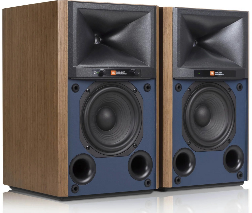 JBL 4305P active bookshelf speakers with sleek black finish and modern design, featuring speaker grills and control knobs.