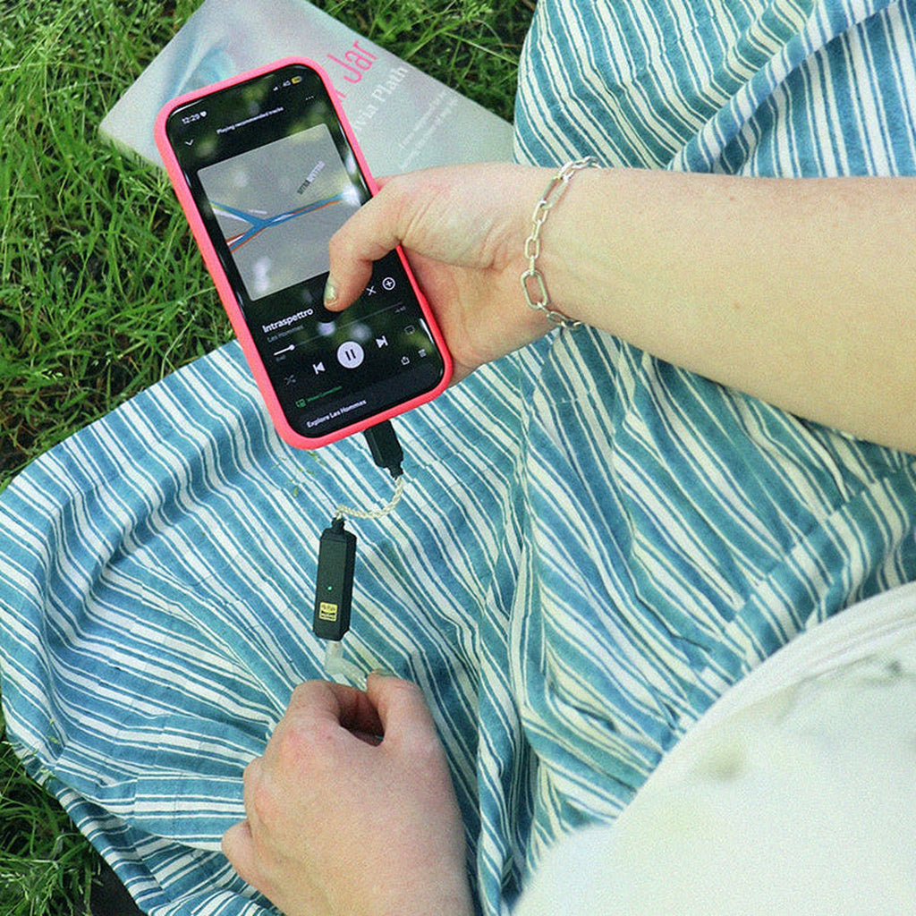 iFi Audio GO link 2 Max held in hand