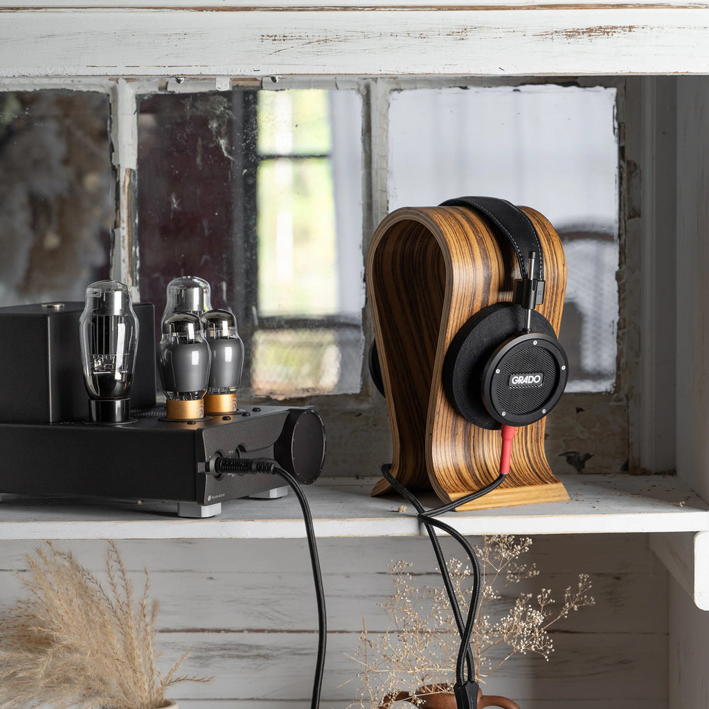 Wired Grado Signature S750 headphones with over-ear design, silver finish, and plush ear cushions for immersive sound.