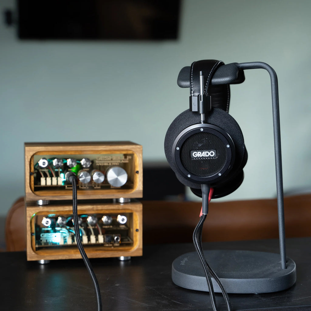 Wired Grado Signature S750 headphones with over-ear design, featuring black ear cups and a sleek cable for high-quality audio.