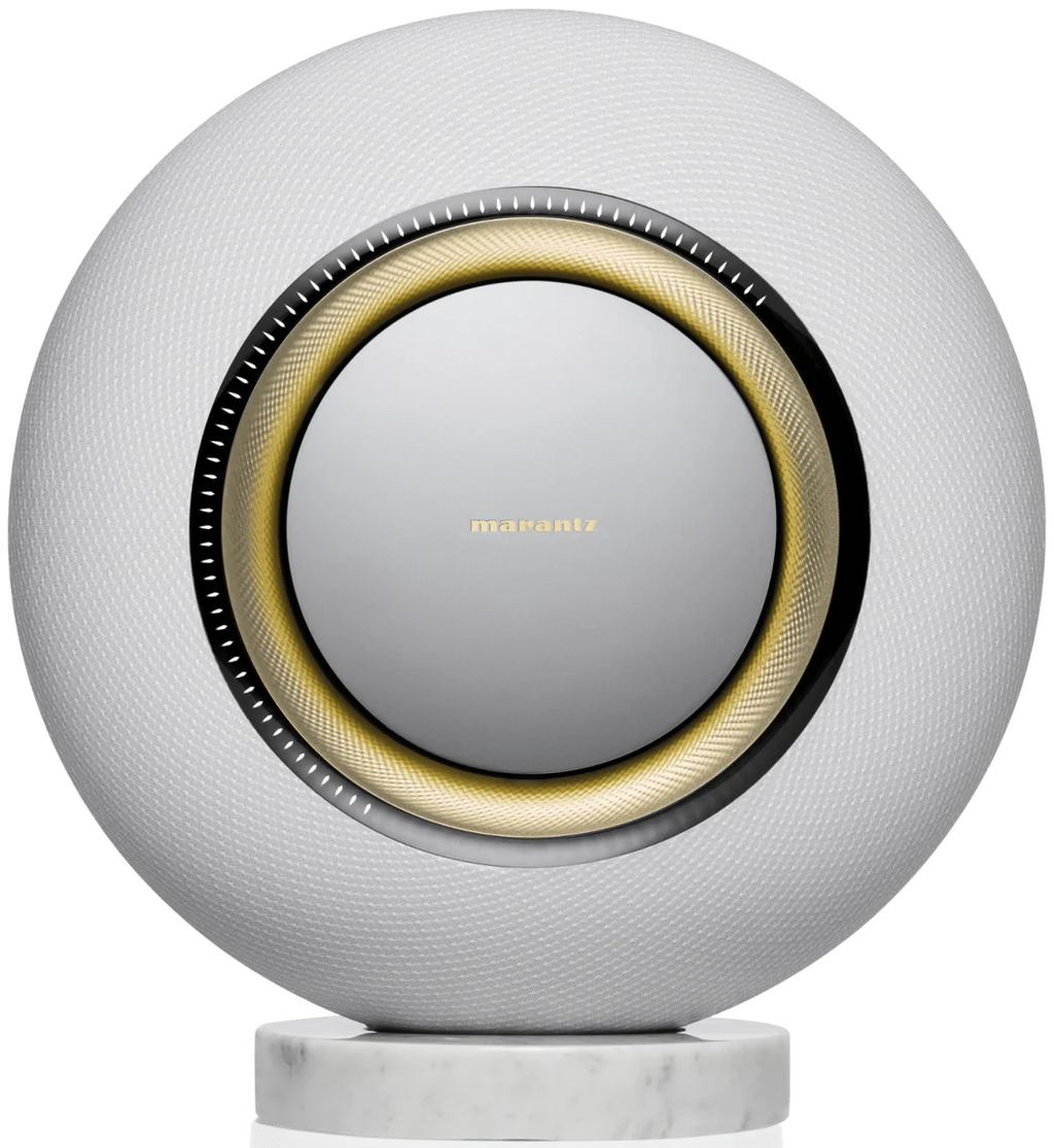 Marantz Horizon Grand wireless speakers with sleek design and modern controls, positioned on a wooden surface.