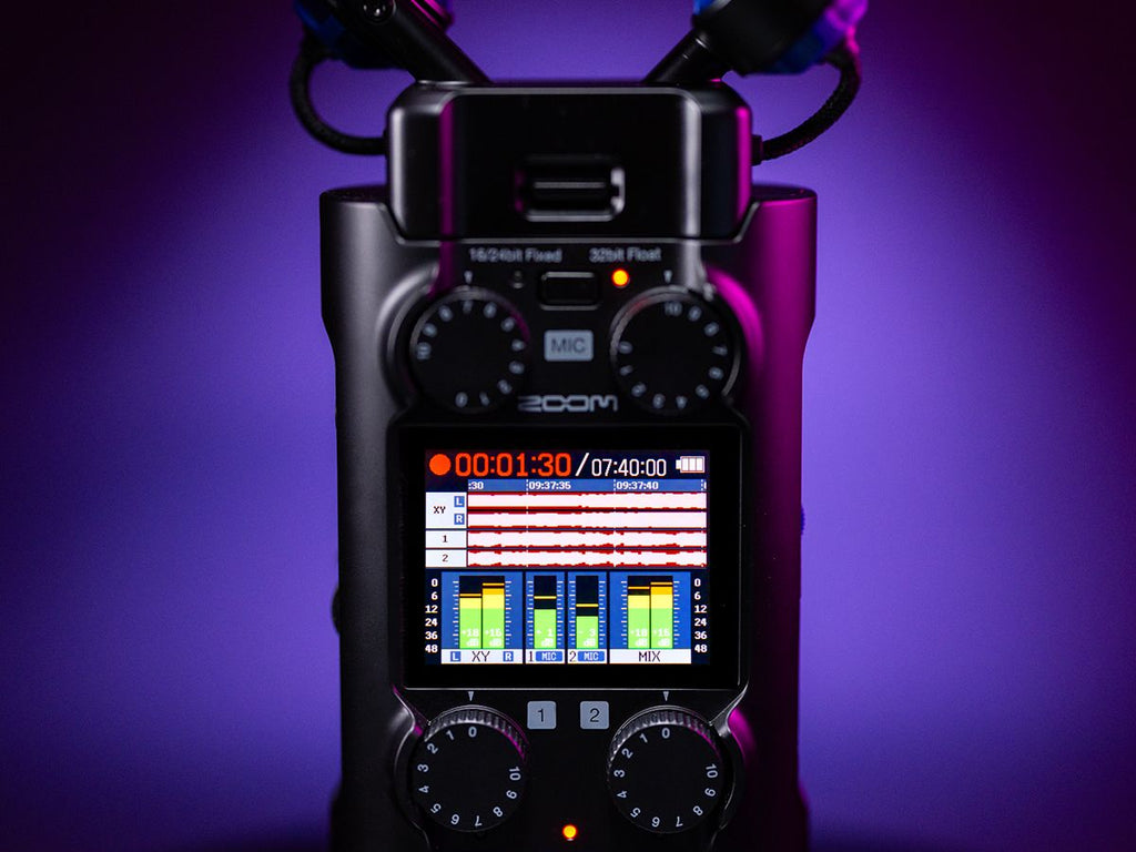 Zoom H5 digital recorder with high-tech display showing controls and recording interface on a sleek, modern device.