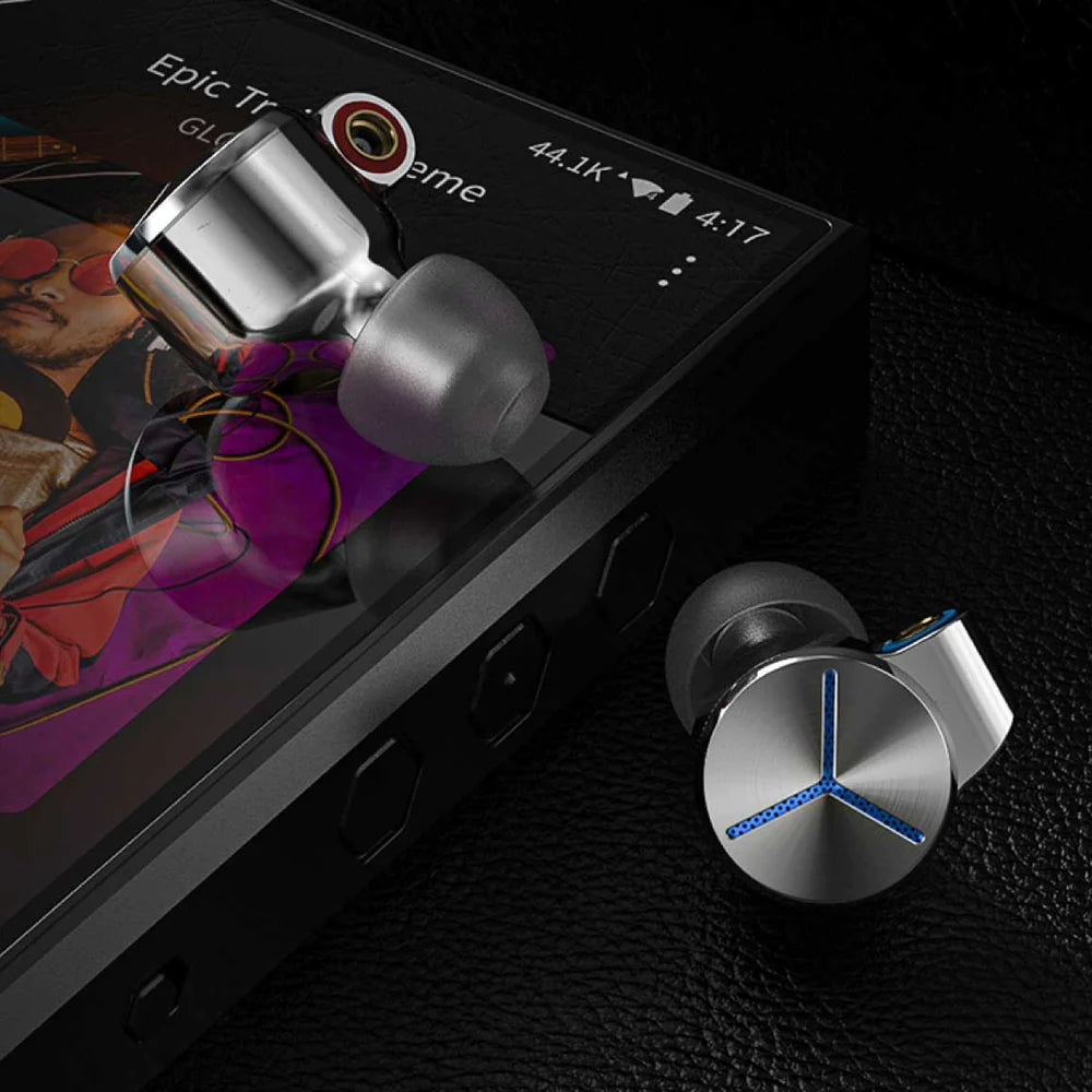 FiiO FA7S in-ear headphones with black earbuds and silver accents, featuring a wired design and ergonomic fit.